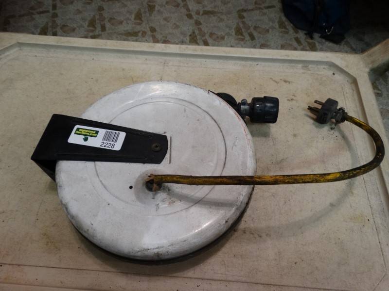 lot 2228 image: Hanging Cord Reel For The Shop Or Garage