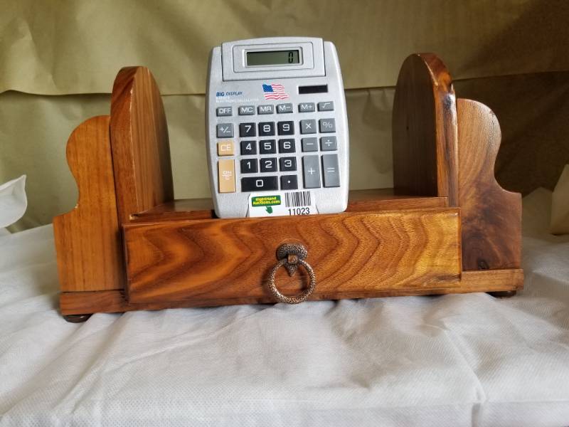 lot 11023 image: Wood Bookcase Organizer and Solar Powered Oversize Calculator