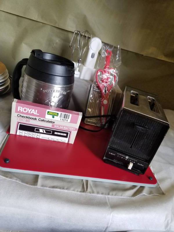 lot 11074 image: General Electric 2 slice toaster, Scissors, Cheese shredder, Pony Express Party Mug, LIFELONG Handheld Portable Cordless Mini Kitchen Mixer