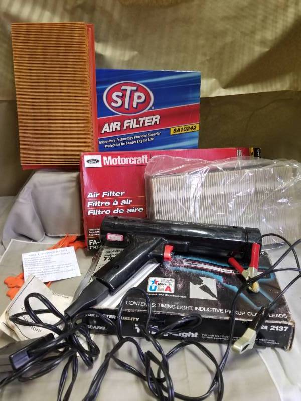 lot 11086 image: Vintage Sears Timing Light Indicator, Inductive Pickup Clamp, 2 Air Filters, six nozzle stopper sets