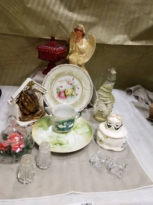 lot 11098 image: Ruby Red Vintage Candy dish, Vintage Relpo Planter #6279, Avon Sea Horse, Granny trinket container, plastic salt and pepper looks like crystal saltpepper shaker, candle holders (2) Vintage Plates, one with RS GERMANY