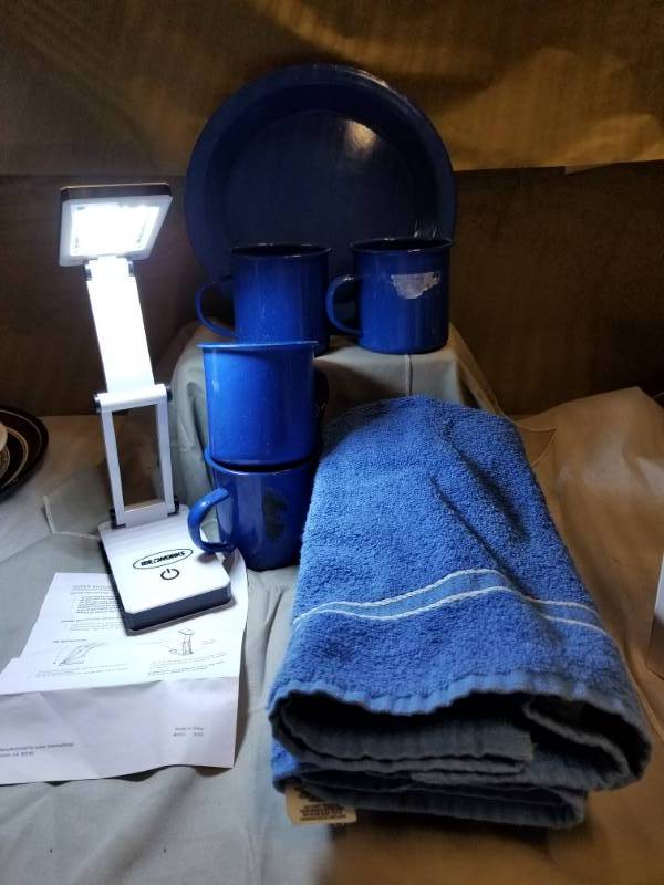 lot 11104 image: CampingTailgating made easier  Blue Enamel Dinner Plates Coffee Cups Enamelware Farmhouse Kitchen Camping Enamelware, Super Bright Portable LED Lamp, 4 Hand Towels