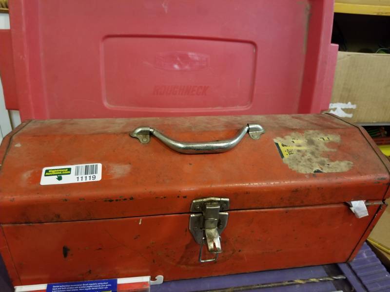 lot 11119 image: Red Metal Tool Box with Metal Handle tray and some tools with plastic and galvanized pipes.