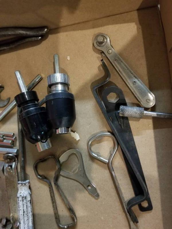 lot 11123 image: Plastic Tool Caddy with Handle, Tools including Allen Wrench Sets, Scissors, Can Openers, Needle Nose Pliers, Wire Cutters, Slip-Joint Pliers, Tongue and Groove Pliers, Variety of Wrenches including open and closed ends.