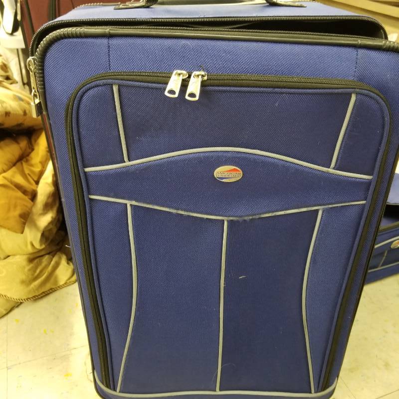 lot 12033 image: American Tourister 4 piece Luggage Set
