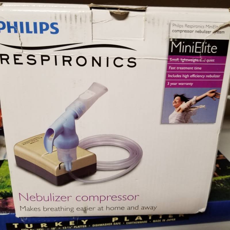 lot 11591 image: Mini Elite Nebulizer