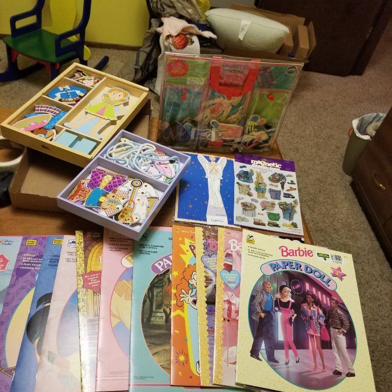 lot 11670 image: Barbie and Disney Paper Dolls, Melissa & Doug Maggie Leigh - Magnetic Dress Up Wooden Doll & Stand