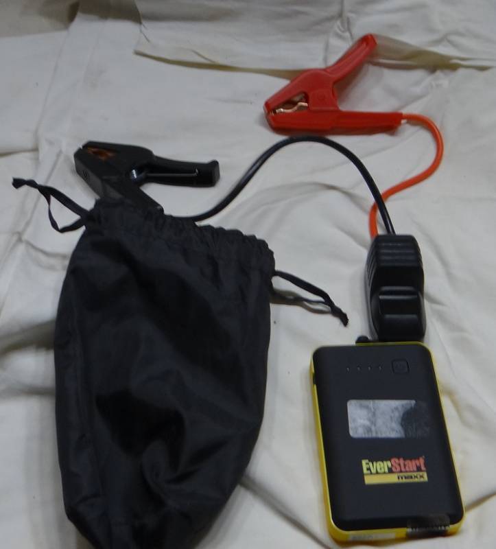 lot 4179 image: Jump Starter - Start your car, charge your phone, flashlight  Handy size with lots of power