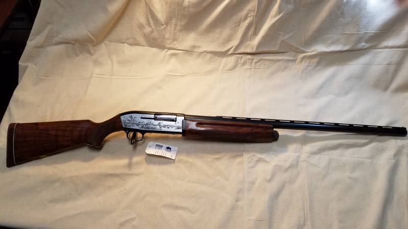 lot 9180 image: Ithaca Lighting 12 Ga Semi Auto - Look at the engraving