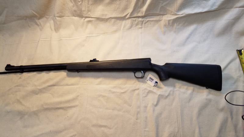 lot 9209 image: BPI New Frontier Modern Inline Muzzleloader.  The stock is a little scuffed, but check out those fiber sights