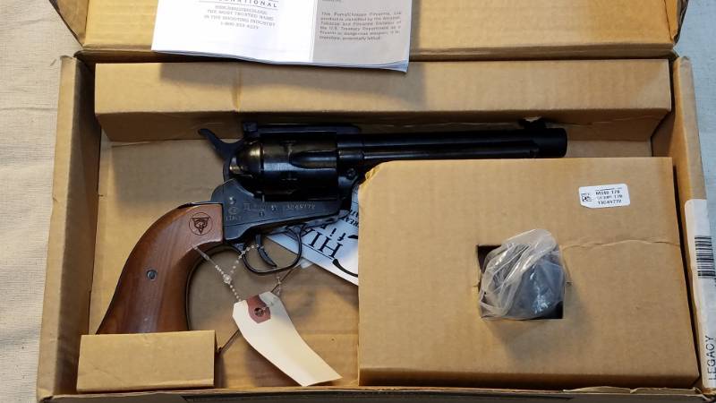 lot 9215 image: Chiappa Puma Model 1873 .22 lr Mag Revolver COWBOY GUN Looks like new, in box, with both cylinders and manuals.