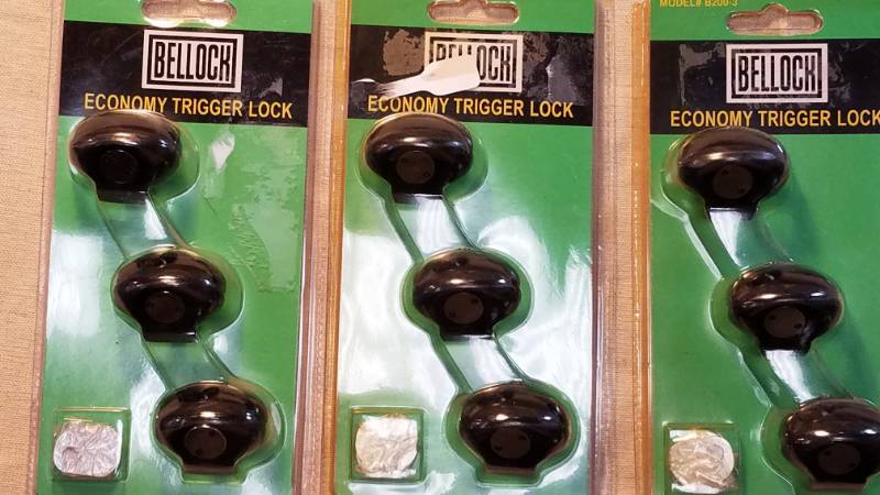 lot 9030 image: Trigger Locks - Nine Locks in Three Unopened Packages