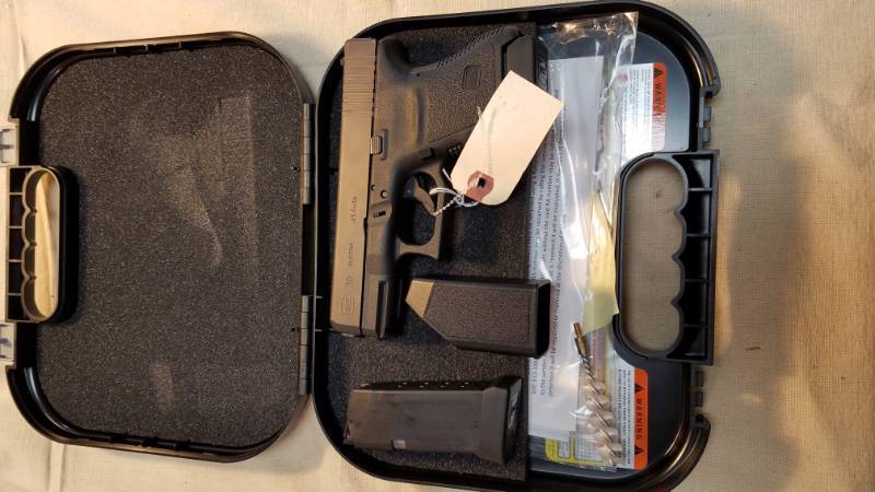 lot 9220 image: Glock Model 30 .45 Caliber, in box will 2 mags, speedloader, cleaning brush, papers.  All you need to supply is the ribbon and bow