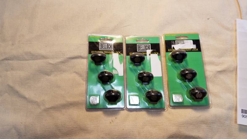 lot 9056 image: Trigger Locks - Nine Locks in Three Unopened Packages