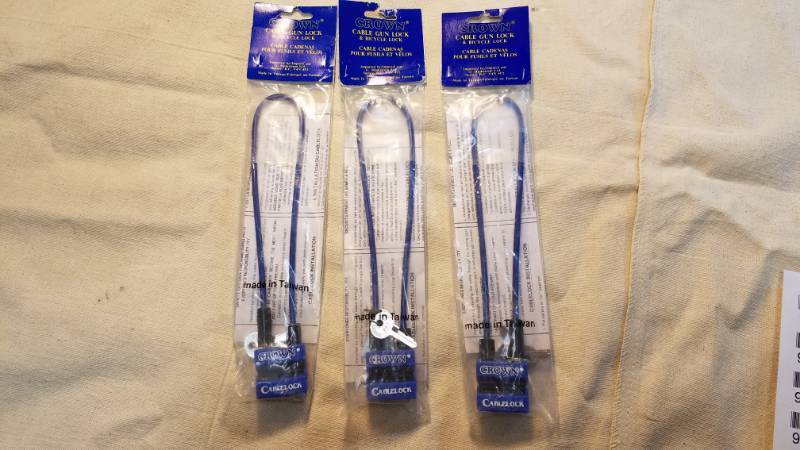 lot 9060 image: 3 Crown Cable Gun Locks (Good for Guns, Bicycles, Tools, What Else)