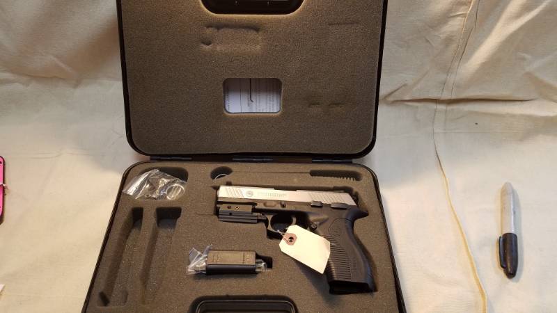 lot 9089 image: Taurus PT 809 9mm In Case, has a rail Laser, which probably needs a battery (No mags included)