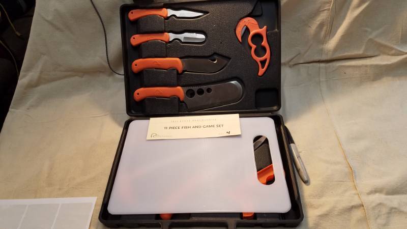 lot 9109 image: Ducks Unlimited 11 Piece Fish and Game Dressing set in a NICE case