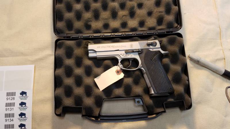 lot 9126 image: Smith & Wesson Model 4566TSW Tactical in Case .45 Caliber Semi-Auto