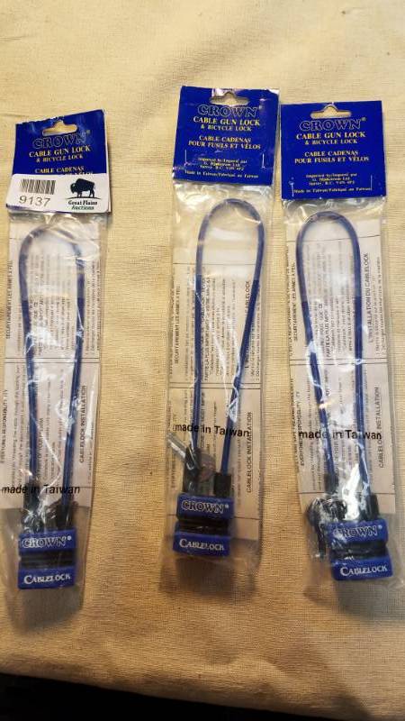 lot 9137 image: 3 Crown Cable Gun Locks (Good for Guns, Bicycles, Tools, What Else)