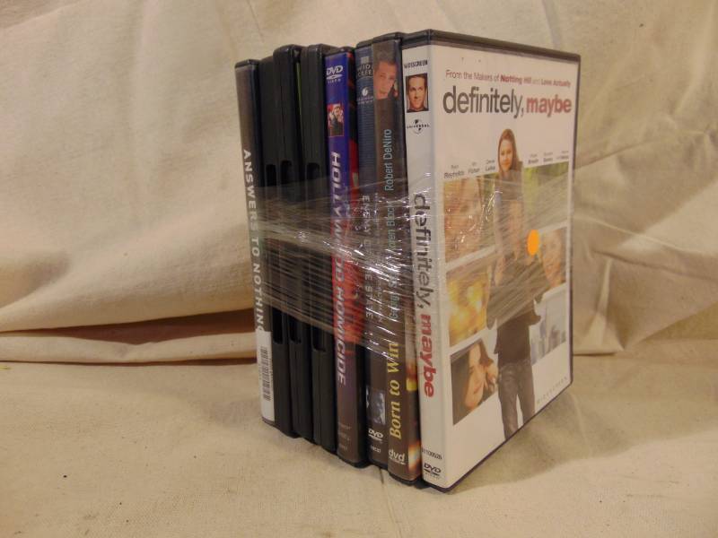 lot 9255 image: DVDs Eight for ONE Bid