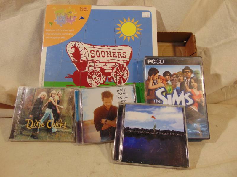 lot 9261 image: Music CDs, Computer Games, Kids Puzzle