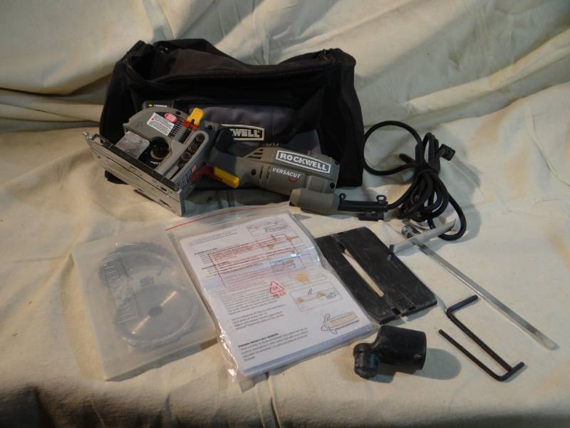 lot 9227 image: Rockwell Versacut Saw - Lots of blades and Accessories in a Rockwell bag - Looks like one super-handy tool