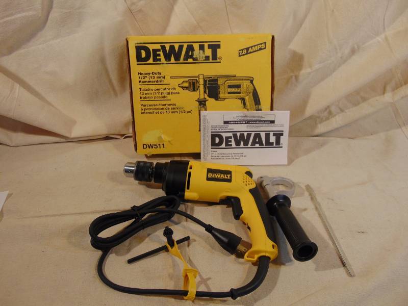 lot 9271 image: Dewalt 12 Hammer Drill in the Box  We were told it was new, never used
