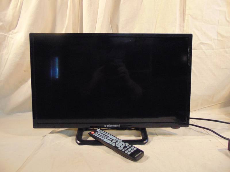 lot 9334 image: Flat Screen TV with Remote