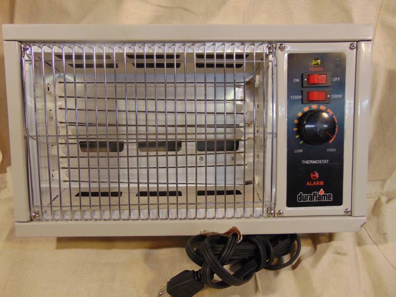 lot 9376 image: Duraflame Heater - Sometimes another blanket just doesnt cut it.