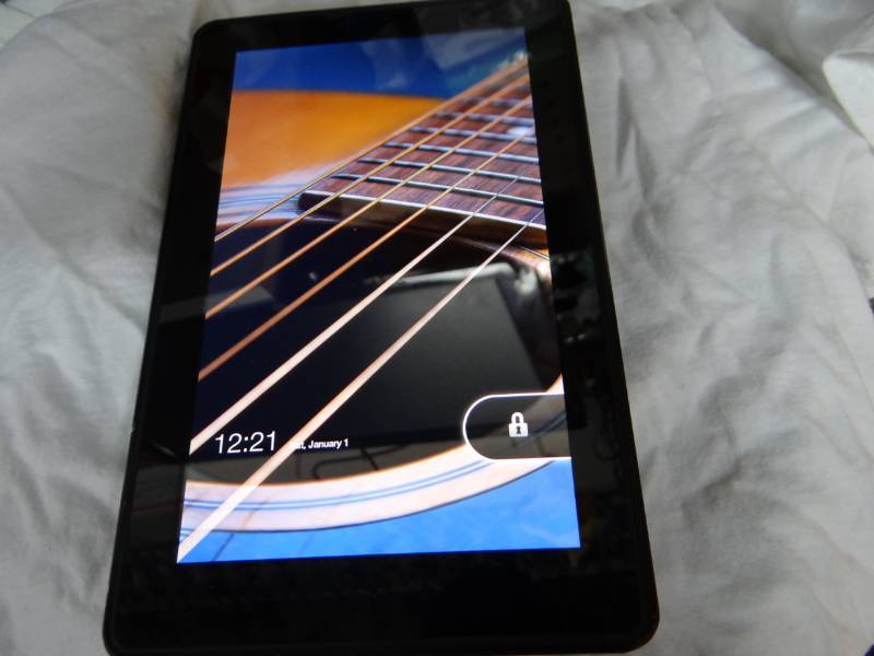 lot 9390 image: Kindle Fire Tablet with Charger