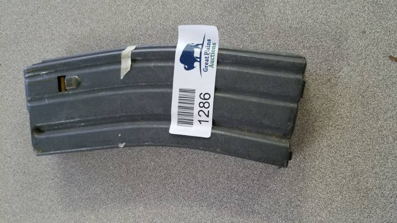 lot 1286 image: Ammo in Magazine Looks like an AR with .223, Not Completely Sure