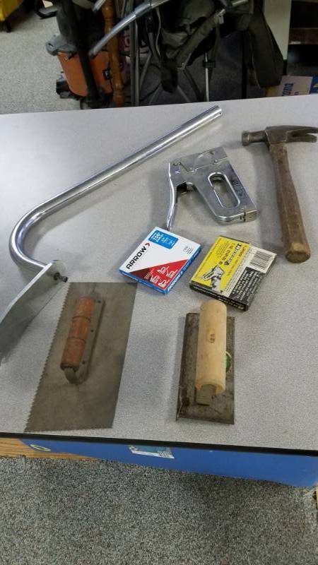 lot 1298 image: Tools lot - Trowels, Concrete Edger, Stapler, Hammer, and Big Wrench