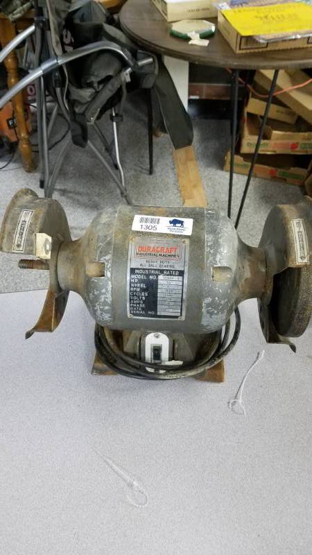 lot 1305 image: Bench Grinder - Looks like it could use a new buffer wheel