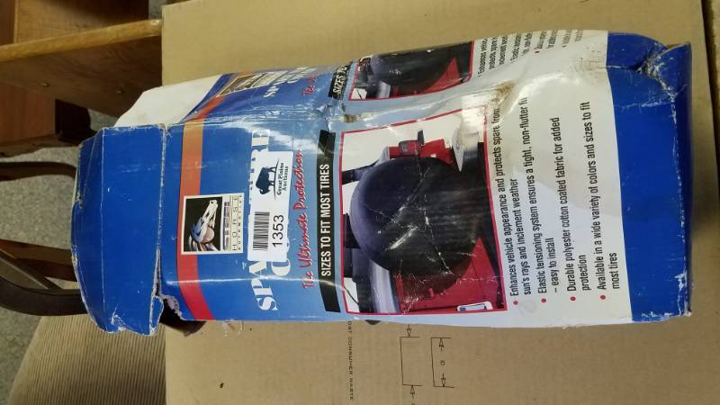 lot 1353 image: Spare Tire Cover In Box